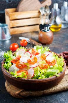 fresh vegetable salad on plate on a table