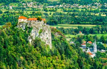 Aerial view of the medieval castle and St. Martin Church in Bled, Slovenia