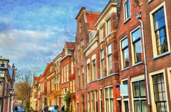 Traditional dutch houses on a street of Leiden, the Netherlands