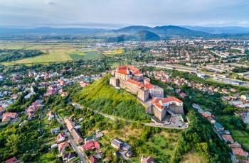 Aerial view of Mukachevo with the Palanok Castle in Zakarpattia, Ukraine