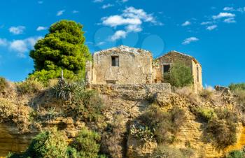 Ancient houses in the gardens of the Valley of the Temples - Agrigento, Sicily, Italy