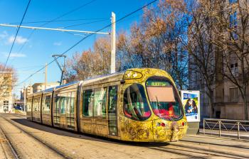 MONTPELLIER, FRANCE - JANUARY 05: Alstom Citadis 302 tram on January 5, 2014 in Montpellier, France. The Montpellier tramway system has 4 lines and 84 stations