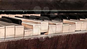 Broken piano keys of an old classic acoustic piano