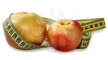 Two Apples with measuring tape isolated on white background