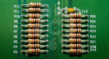 Background from the circuit board of the electronic device with resistors close-up