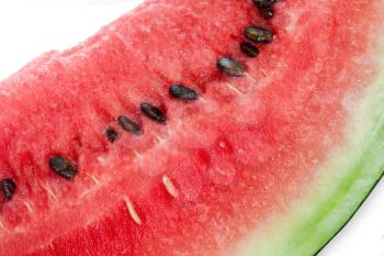 A slice of ripe juicy watermelon close-up on a white background