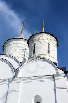 Courtyard of Spaso-Prilutsky Monastery in the Vologda city, Russia. Summer sunny day. White church. Top part of the building