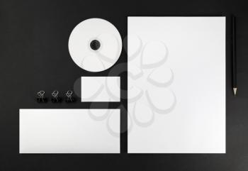 Blank stationery and corporate identity template on dark background. Mock-up for graphic designers portfolios. Top view. 