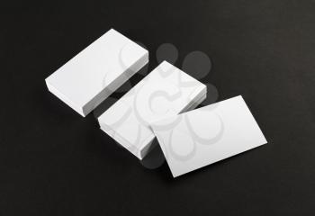 Blank business cards on black background. Template for ID.