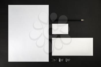 Corporate identity template on black background. Top view.