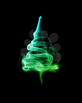 Abstract Christmas Tree of Smoke  on a dark background.