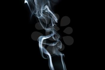 Abstract smoke. Swirls of smoke on black background. Studio shot.