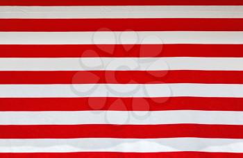 Red and white striped fabric background. Striped red and white color texture. USA stripes flag.