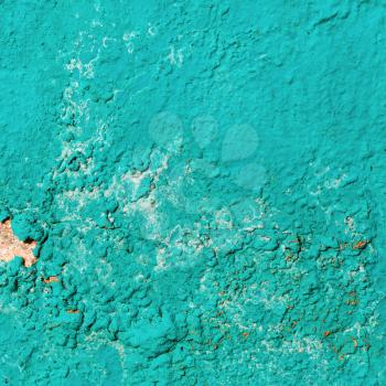 Bright turquoise grunge material. Peeling paint texture.