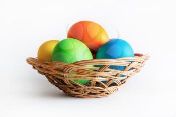Easter eggs in basket. Colorful easter eggs.