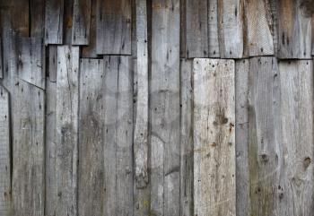 Old weathered wooden planks from the weather.