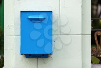 Old, painted in blue mailbox in retro style.