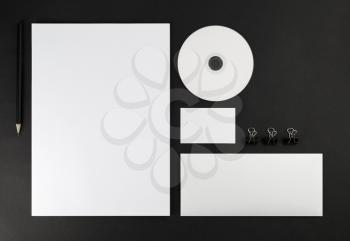 Corporate identity template on black background. Top view.