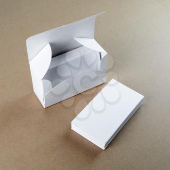 A box with blank business cards and a stack of business cards.  For design presentations and portfolios.