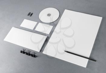 Photo of blank stationery set on gray background. Template for branding identity. For design presentations and portfolios.