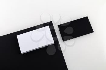 Black and white business cards. Template for branding identity for designers. Top view. Isolated with clipping path.