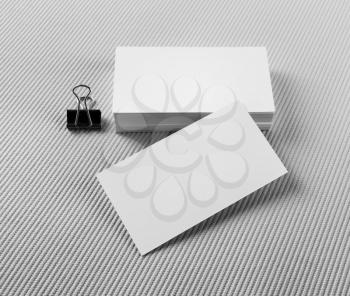 Blank business cards on gray background. Mock-up for branding identity.
