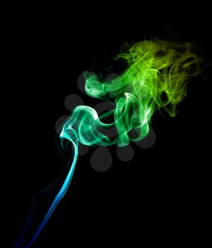 Abstract bright colored green smoke on a dark background.