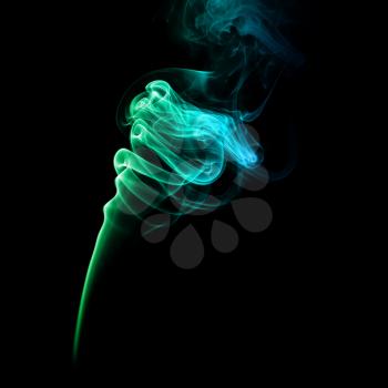 Abstract bright green smoke on a dark background.