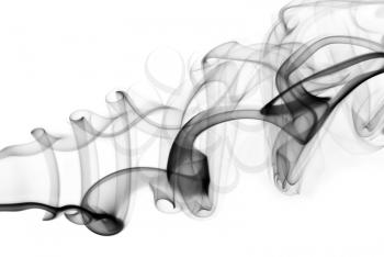 Photo of abstract smoke swirl on white background. Studio shot.