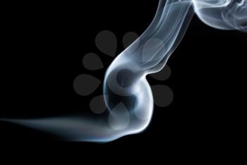 Abstract smoke wave on black background. Studio shot.