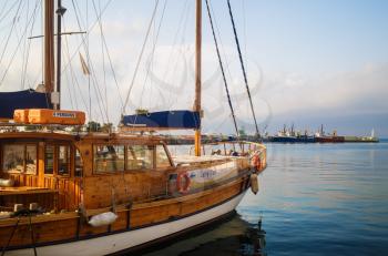 Nesebar, Bulgaria - September 05, 2014: Pleasure yacht in the port of the old town of Nessebar. Black Sea coast. Wooden sailing ship. Sunny summer day.