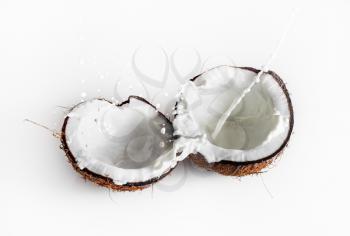 Coconuts with milk splash. Healthy food. Ripe coconut