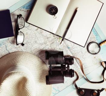 Travel equipment background. Outfit and accessories of traveler. Vintage toned image. Top view. Flat lay.