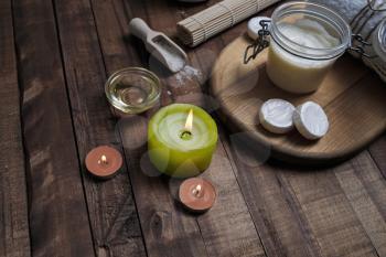 Spa cosmetic objects on wood table background. Beauty threatment concept.