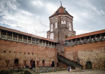 Mir, Belarus - August 04, 2017: Ancient medieval castle with tower in Mir, Belarus. Courtyard of the fortress. UNESCO World Heritage.