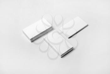 Blank business cards on white paper background. High size mockup.