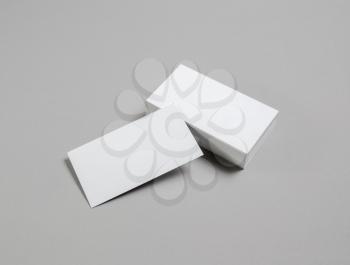 Photo of blank white business cards on paper background. Template for branding identity.