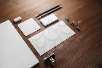 Blank stationery template on wood table background. Mock-up for branding identity. For design presentations and portfolios.
