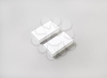 Photo of blank business cards on paper background. Mockup for branding identity.