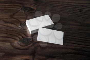 Blank business cards on wooden background. Responsive design template.