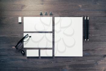 Blank stationery set on wooden background. Template for branding identity. For graphic designers presentations and portfolios. Top view. Flat lay.