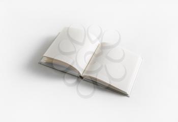 Blank opened book on white paper background. Template for graphic designers portfolios.