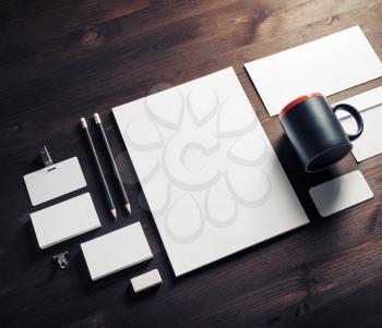 Blank corporate identity template on wood table background. Stationery mock up. Responsive design mockup.