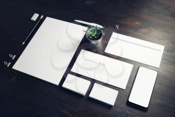 Blank stationery set on wood table background. Corporate identity template. Branding mock-up.