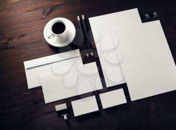 Corporate identity template. Photo of blank stationery set on wooden background.