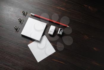 Corporate identity template. Blank stationery mock up on wooden background. Notes, pencil, eraser and sharpener.