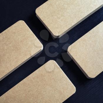 Close-up brown paper business cards mock-up. Template for branding ID.