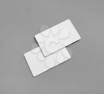 Blank business cards mockup on gray background. Copy space for text.