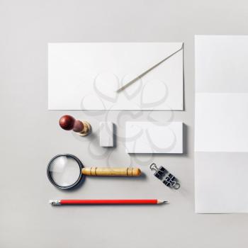 Photo of blank stationery set on paper background. Corporate identity template. Responsive design mockup. Top view. Flat lay.