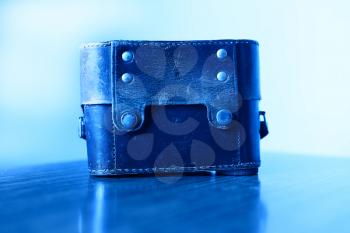 Horizontal blue vintage camera case background